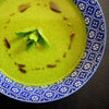 minty pea soup drizzled with wild mountain pepperberry infused canola oil