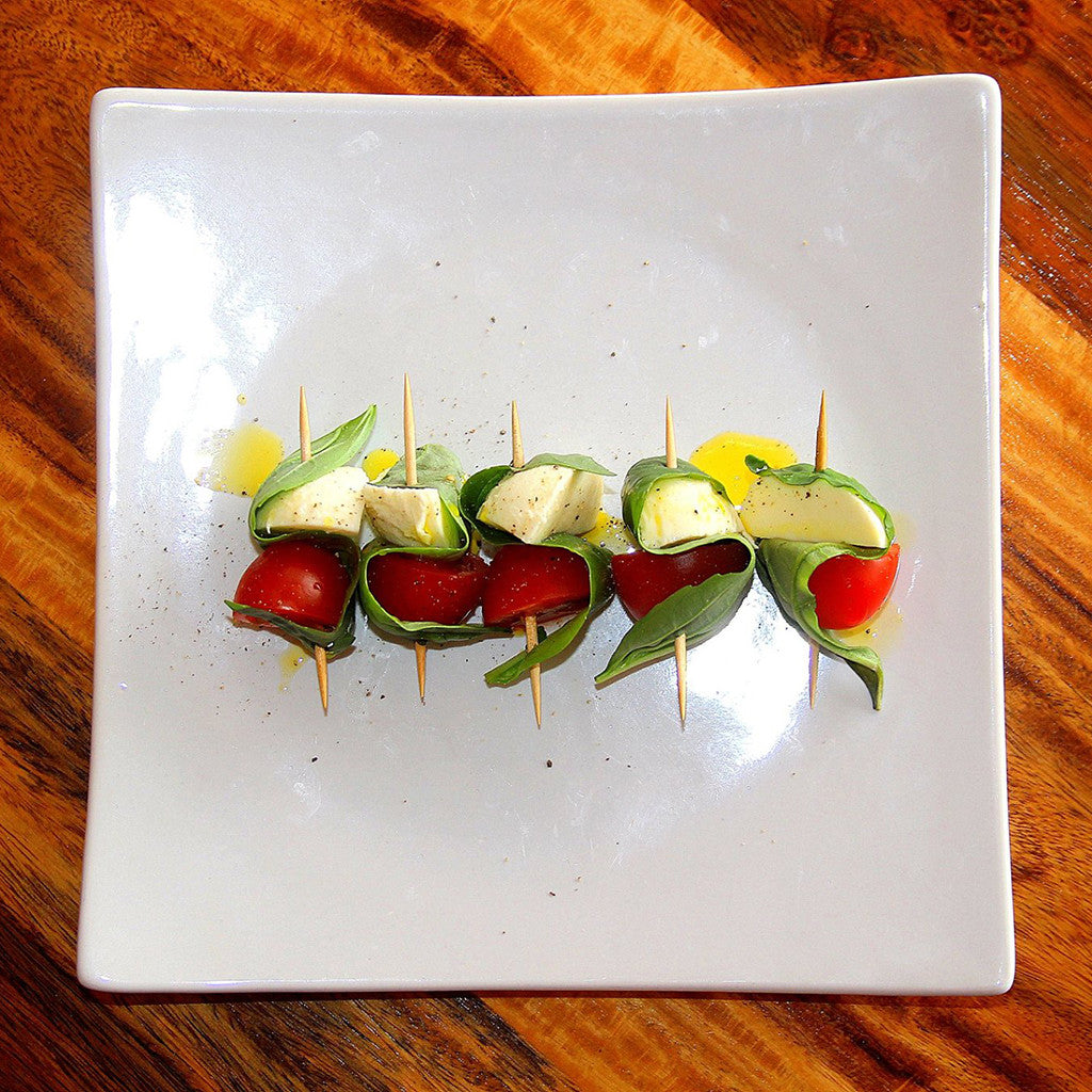 Canapes drizzled with lemon infused canola oil